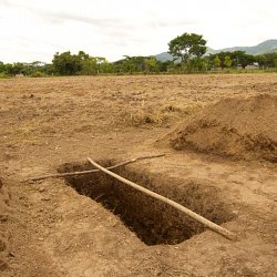 A grave waits to be filled, Honduras (photo by Marc Silver)