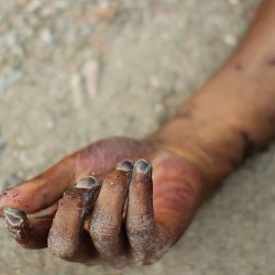 The hand of a dead migrant found in the desert (photo by Marc Silver)