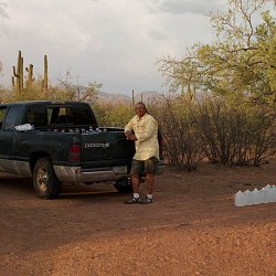 Humanitarian worker leaving water along migrant trails (photo by Marc Silver)