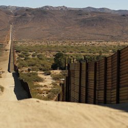 The border wall with the US on the left, Mexico on the right (photo by Marc Silver)